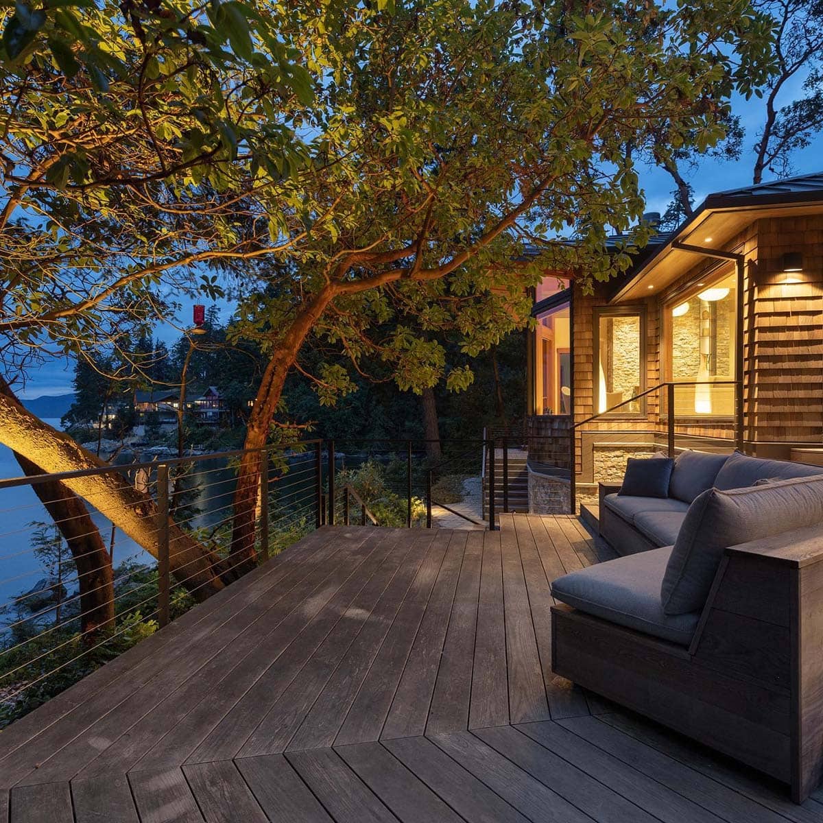 coastal modern home exterior patio at dusk