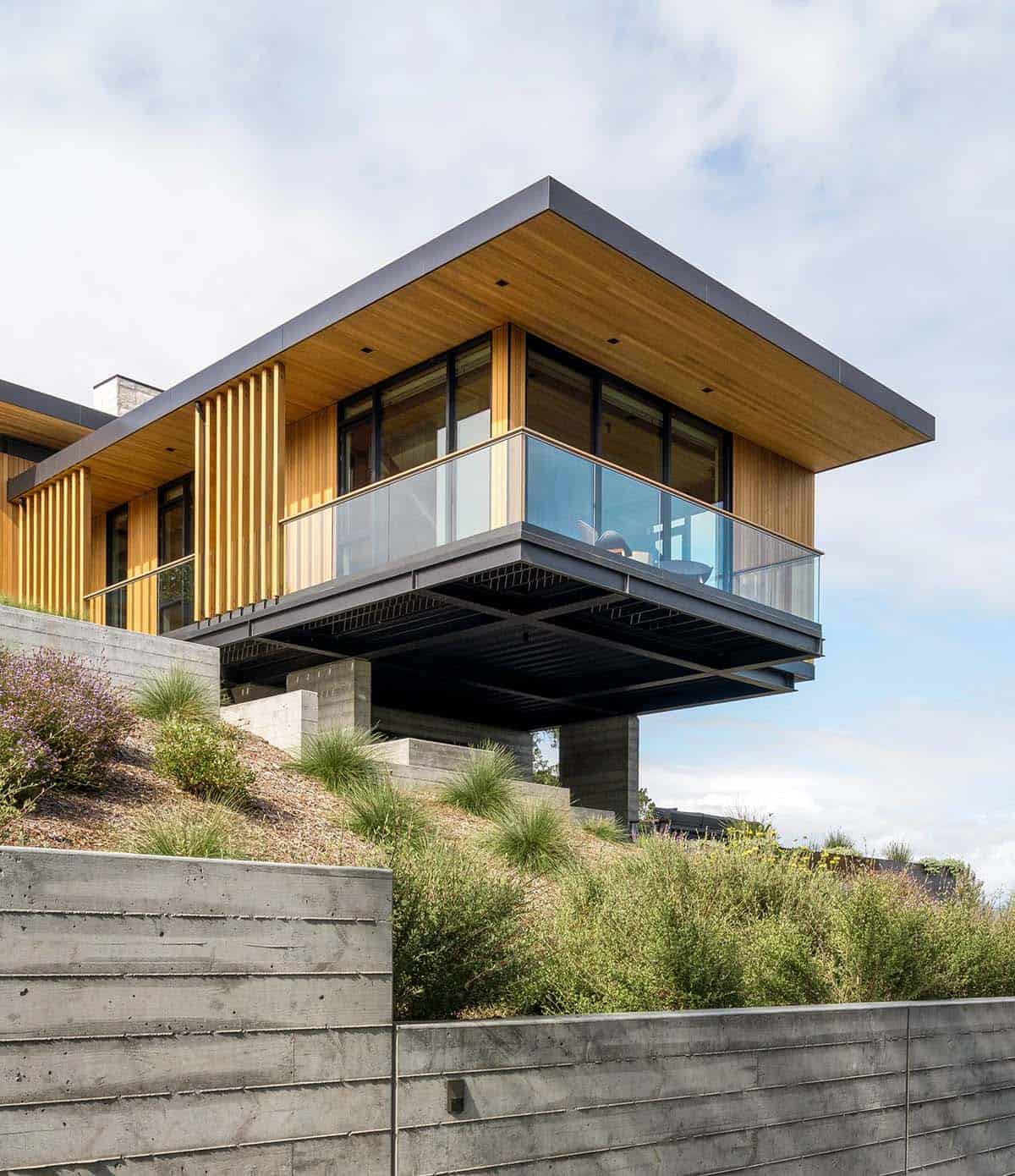 contemporary home exterior cantilevered over a hillside