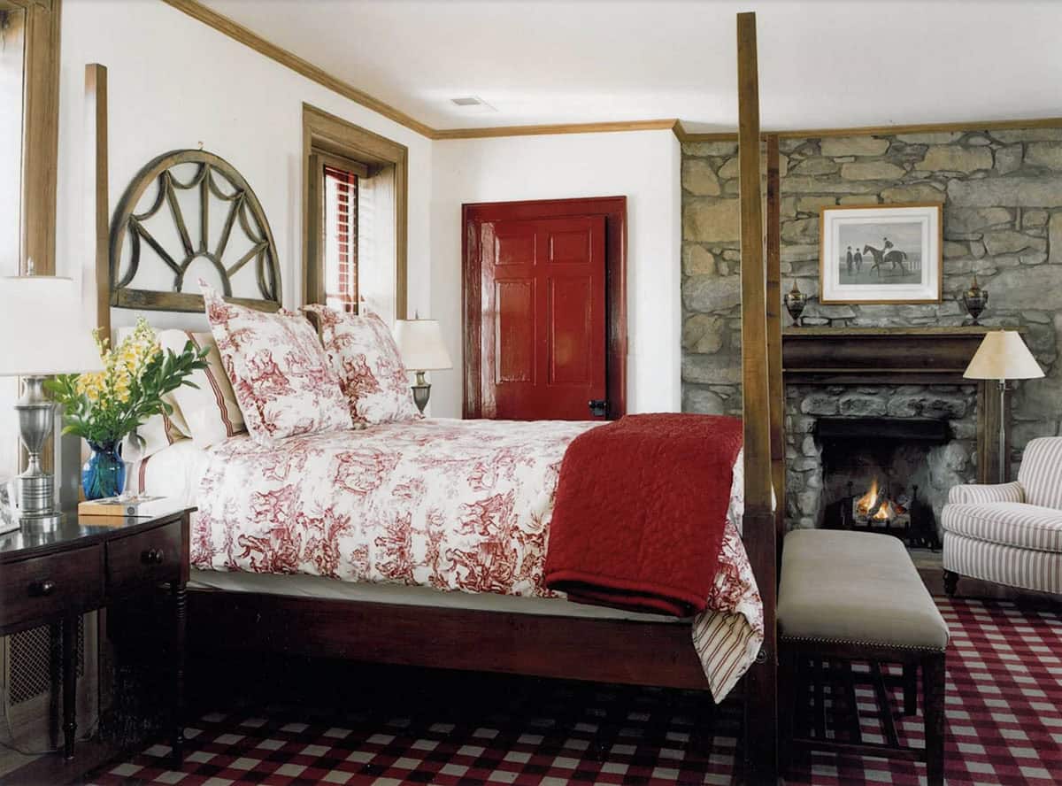 farmhouse style bedroom with a four poster bed 