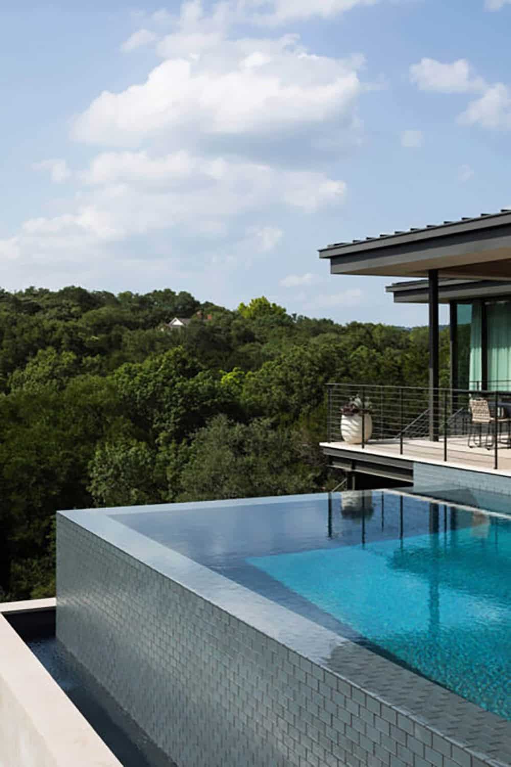 contemporary home exterior with a pool