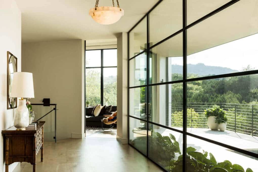 contemporary hallway with a glass wall