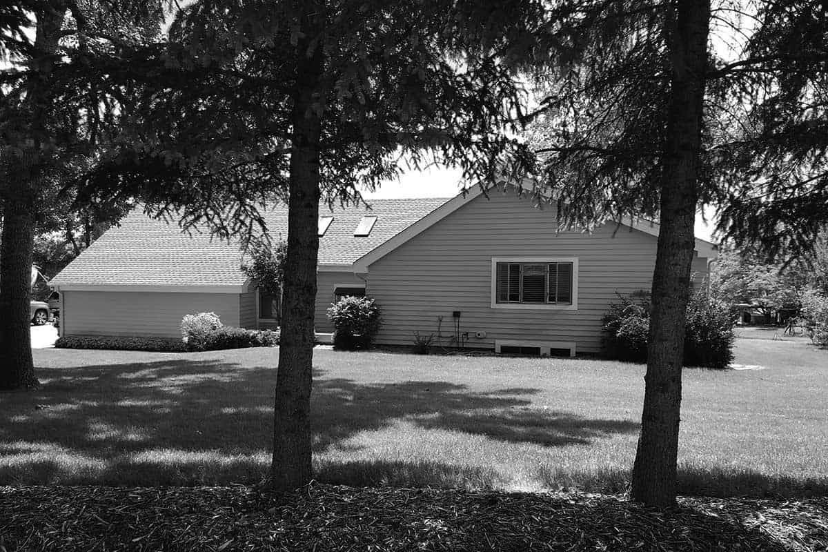 french country home exterior before the remodel