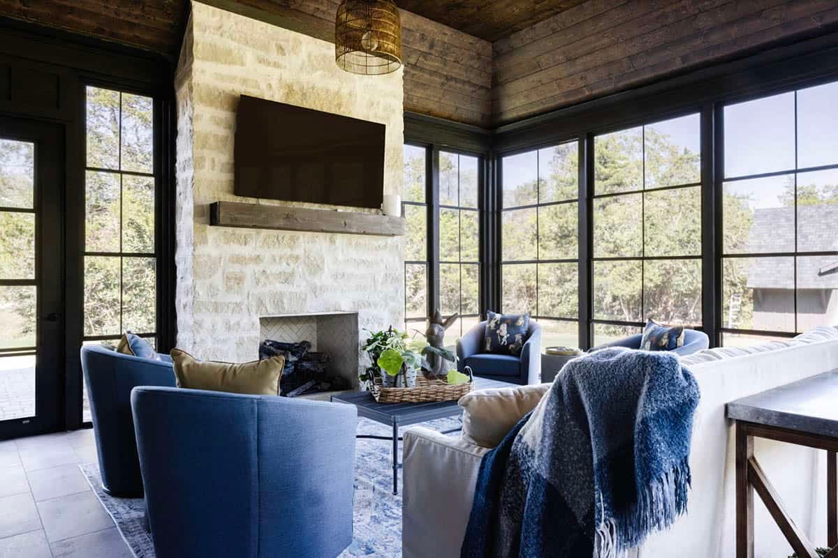 French Country Sunroom with a fireplace