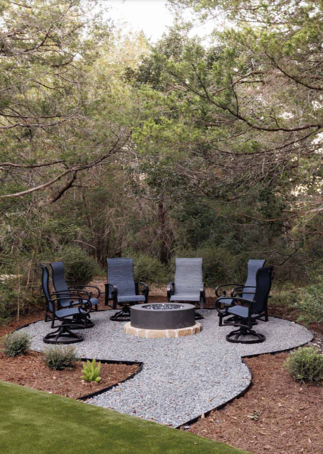 French Country Patio with a fire pit