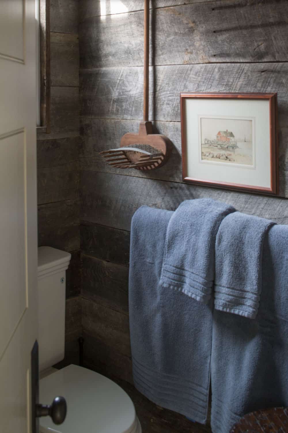 Farmhouse Guest Bathroom with barnwood walls