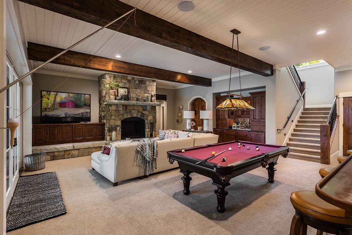 contemporary recreation room with a pool table