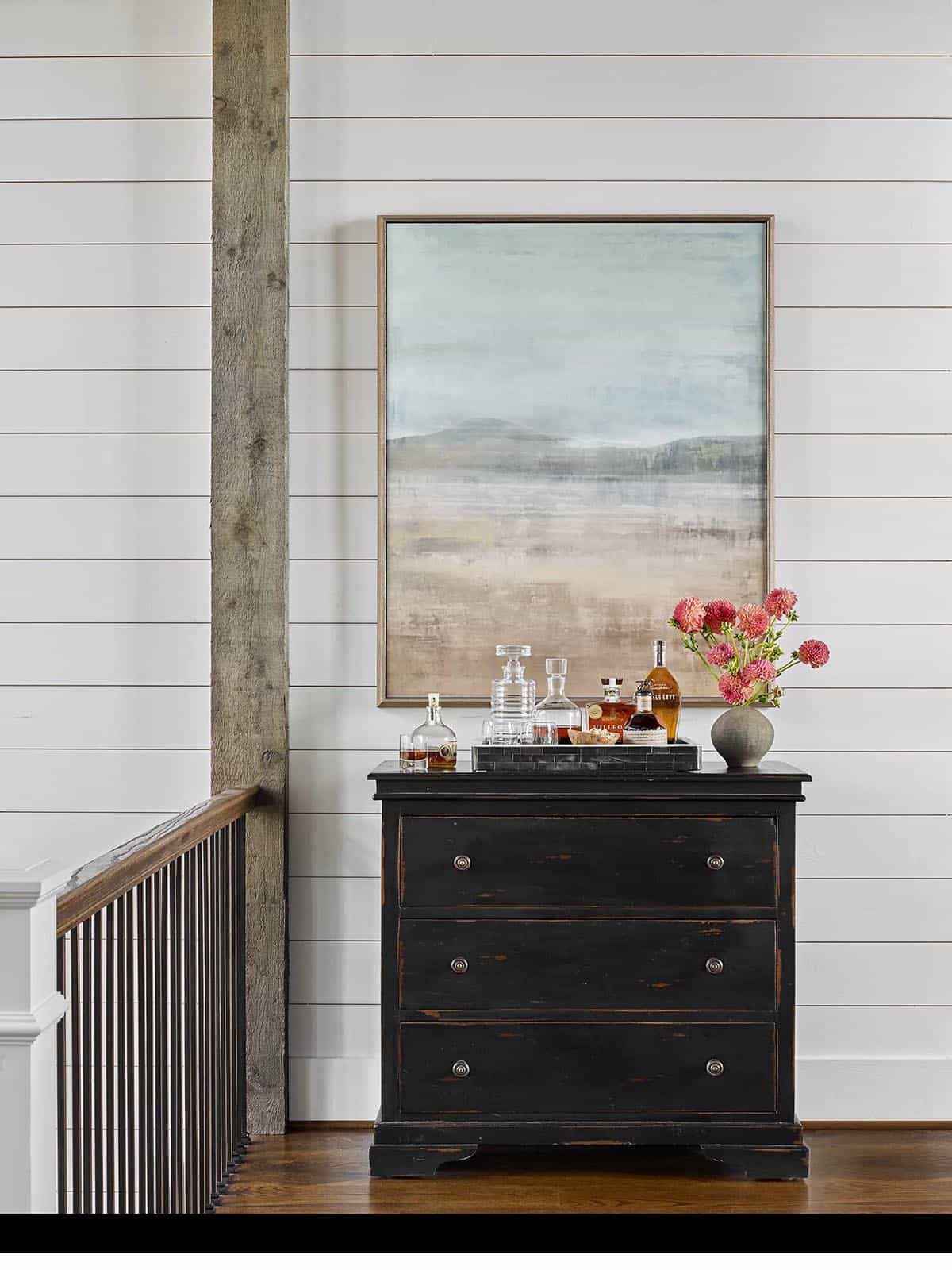 contemporary hallway with a dresser