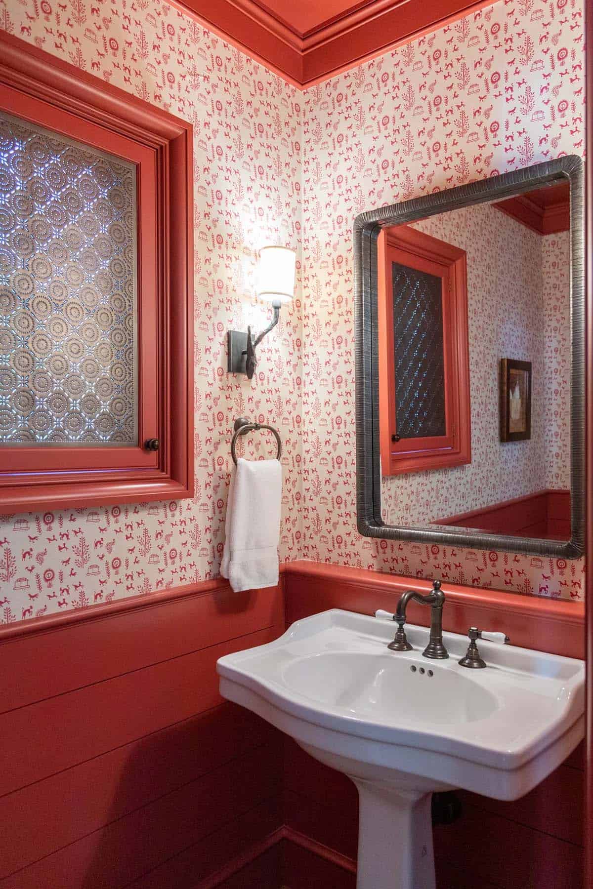 powder room with red accents