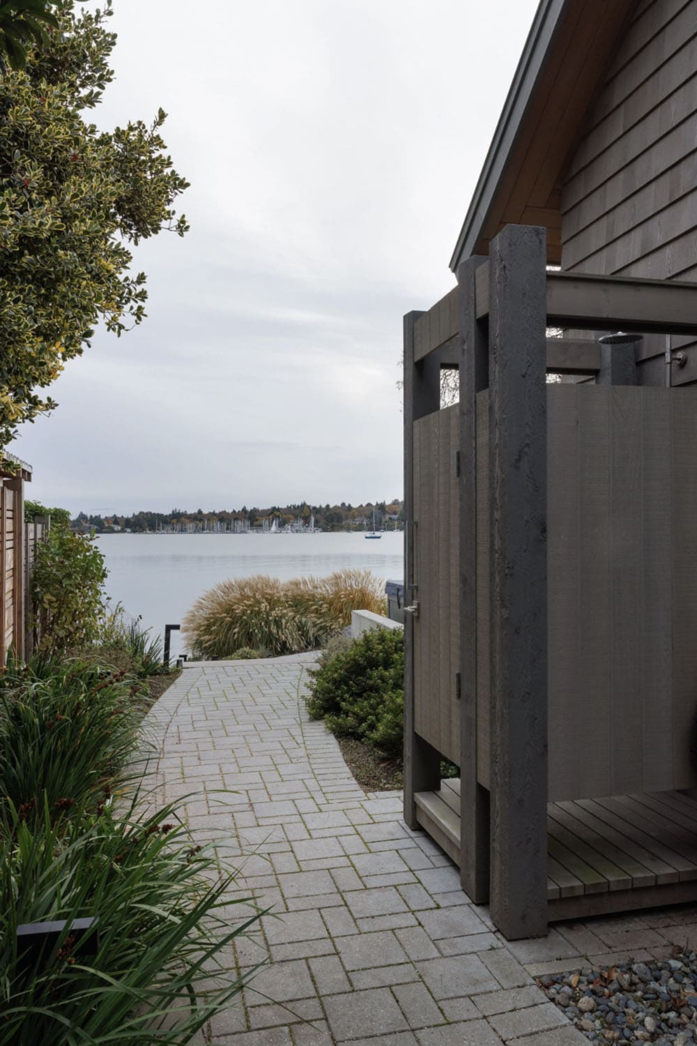 beach style home exterior with an outdoor shower