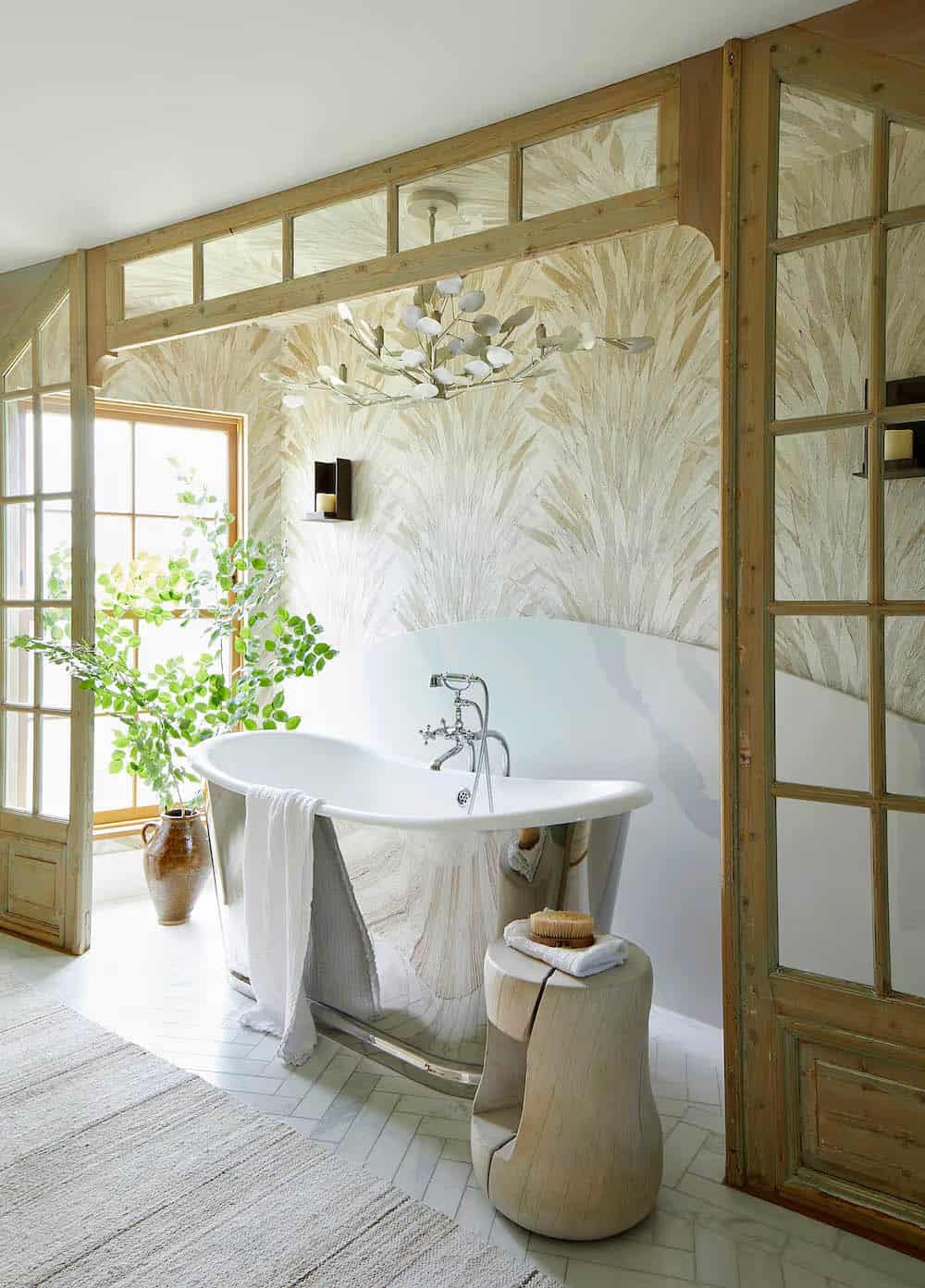 modern coastal style bathroom with a freestanding tub