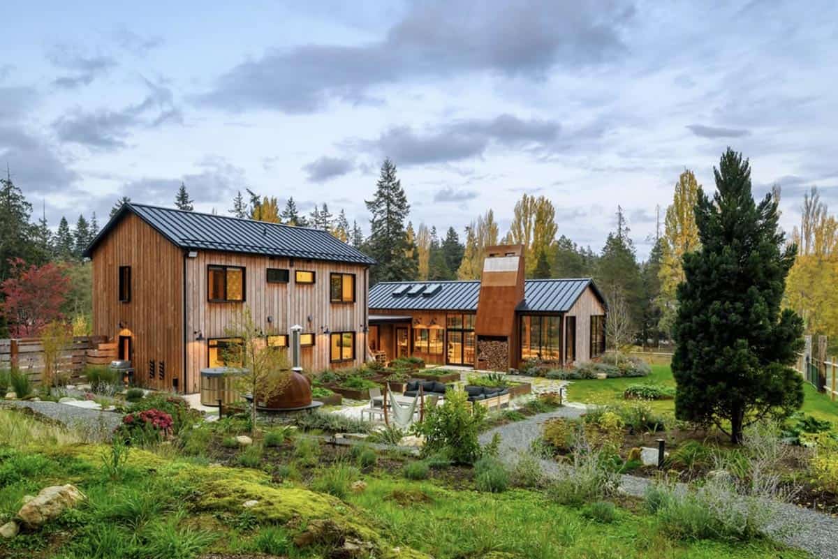 modern farmhouse family home exterior with a garden on orcas island