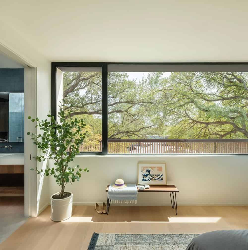 modern bedroom with a large window