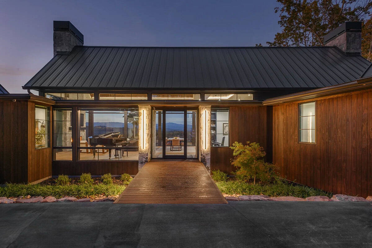 modern lake house exterior at dusk