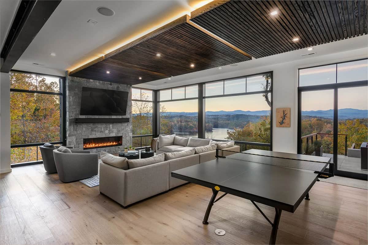 modern family room with a ping pong table 