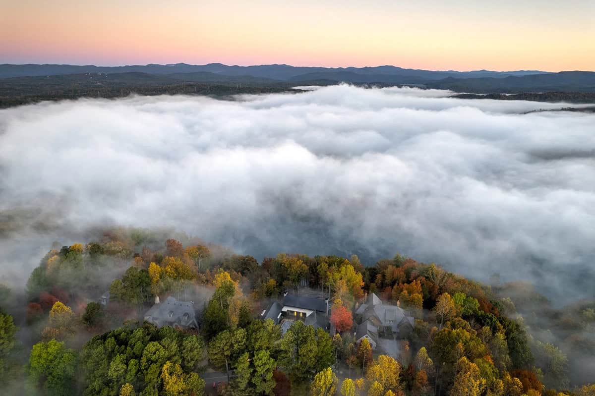 modern lake house exterior aerial view