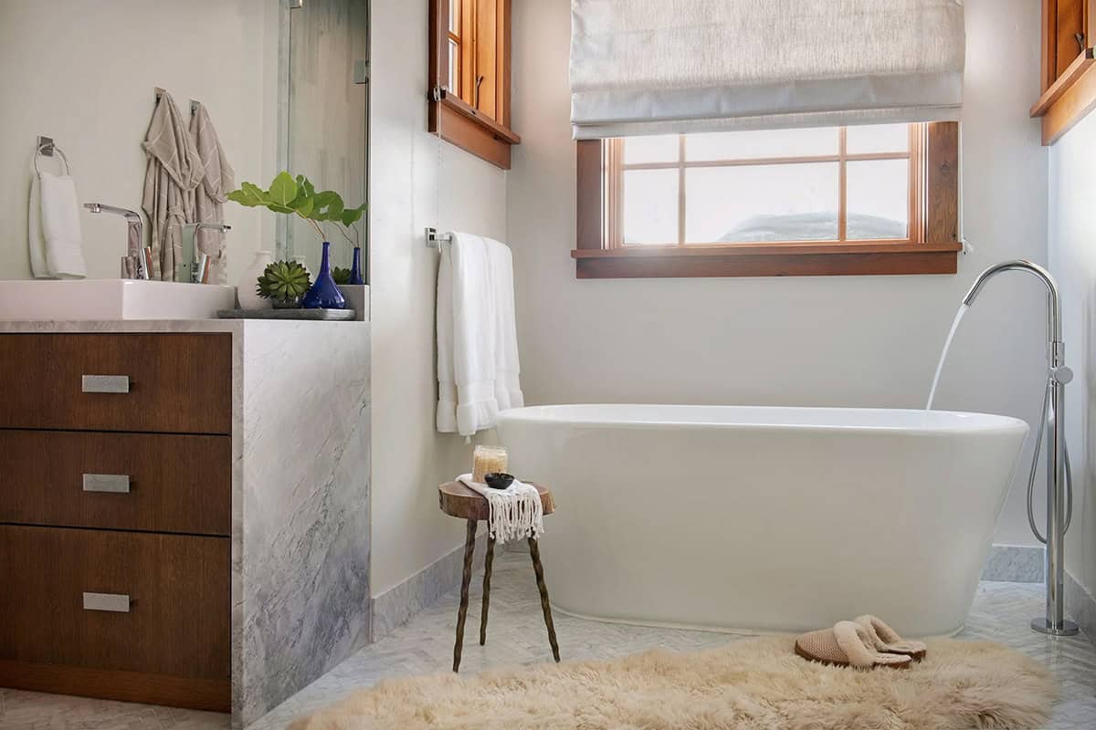 modern rustic bathroom with a freestanding tub