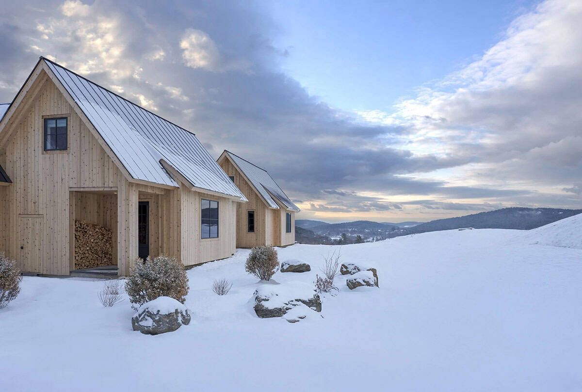 modern scandinavian home exterior with snow