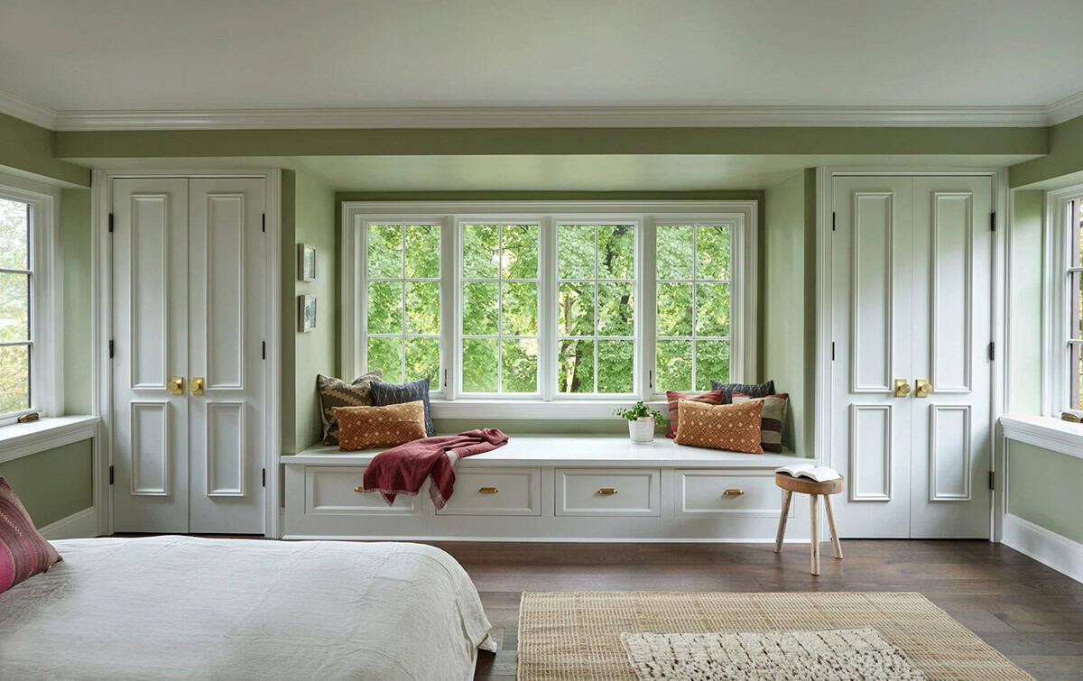 modern bedroom with a built-in window seat