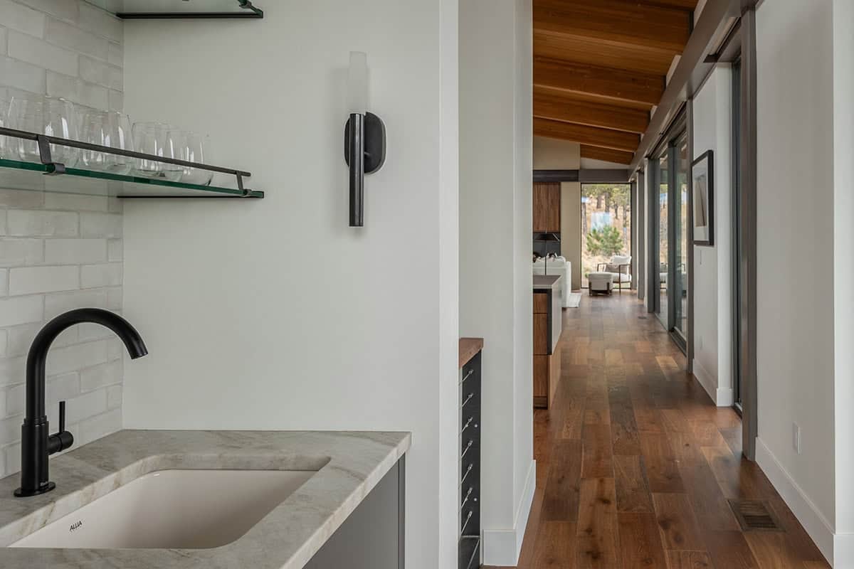 modern kitchen pantry with a sink