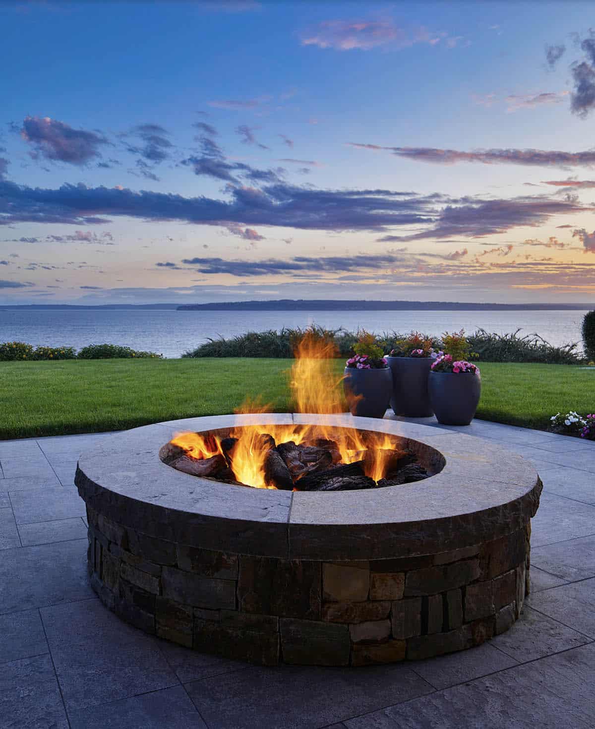 Transitional Patio with a fire pit