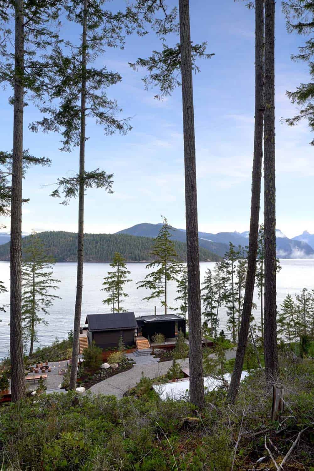 modern coastal home exterior with a view of the water