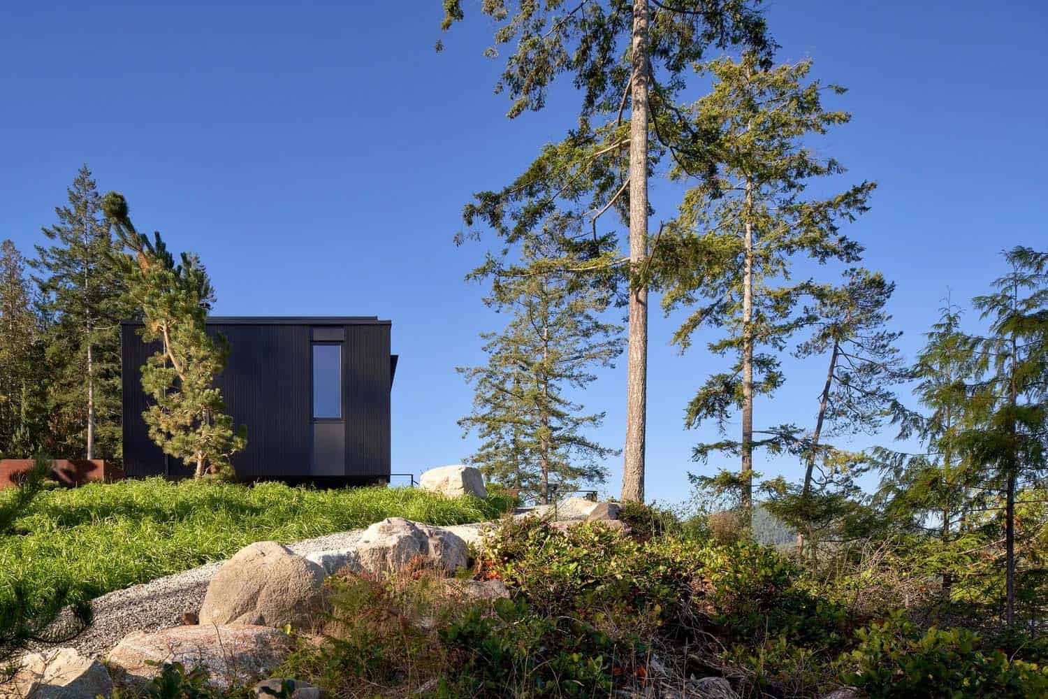 modern coastal home exterior with tree views