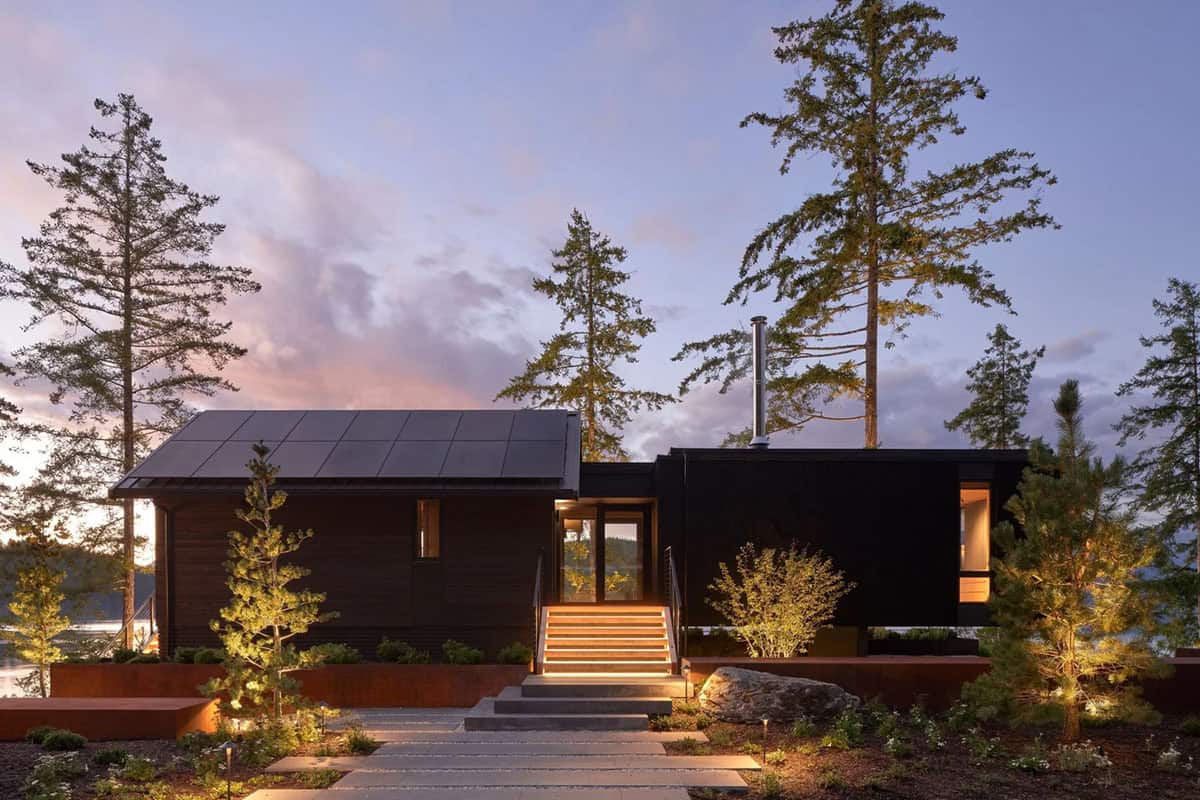 modern coastal home exterior at dusk