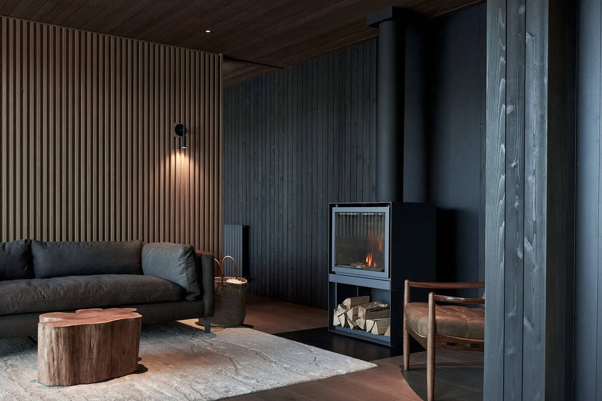 modern coastal living room with a fireplace
