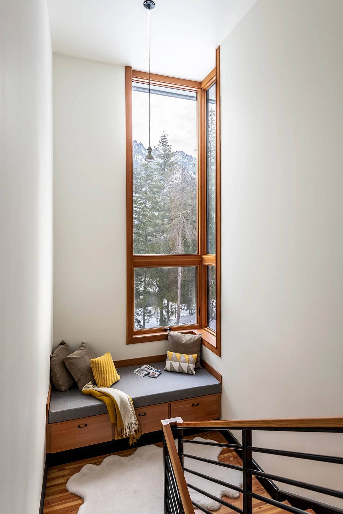 rustic staircase with a built-in window seat