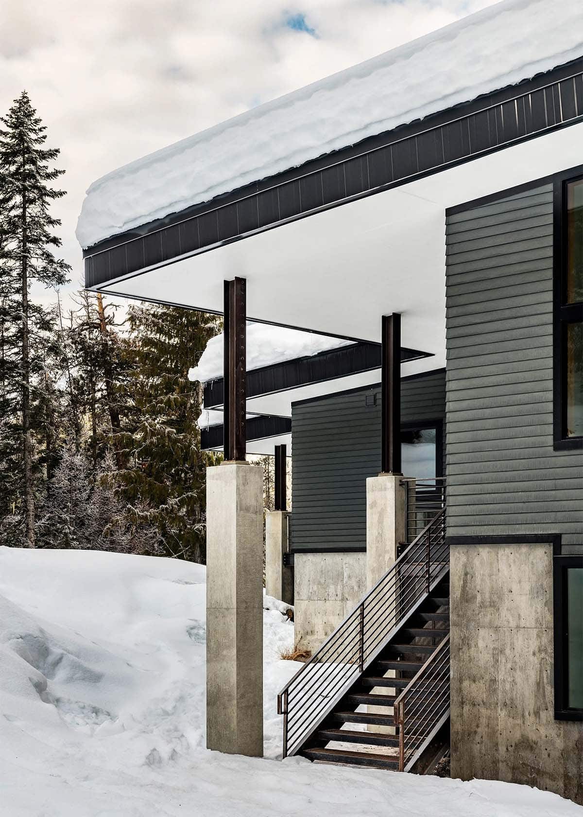 off-grid mountain cabin exterior with snow