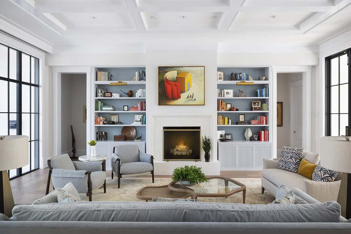coastal style living room with a fireplace