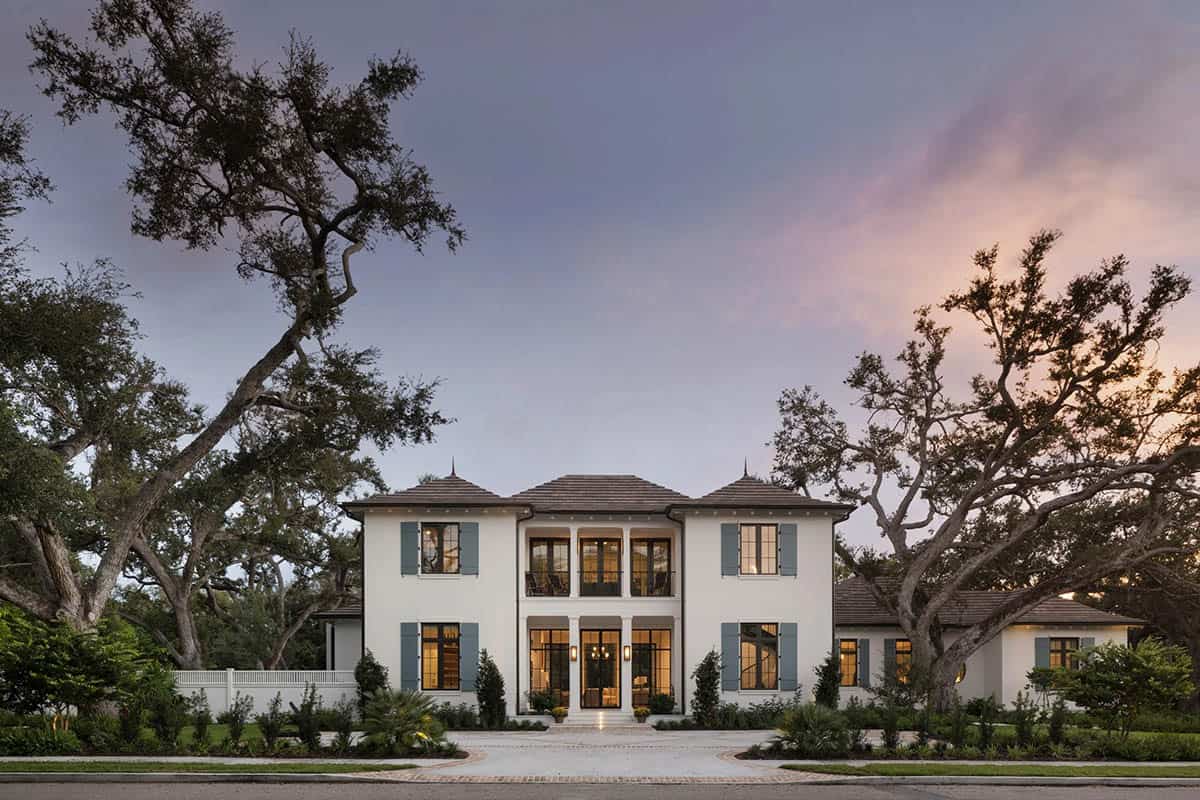 coastal style home exterior with live oak trees