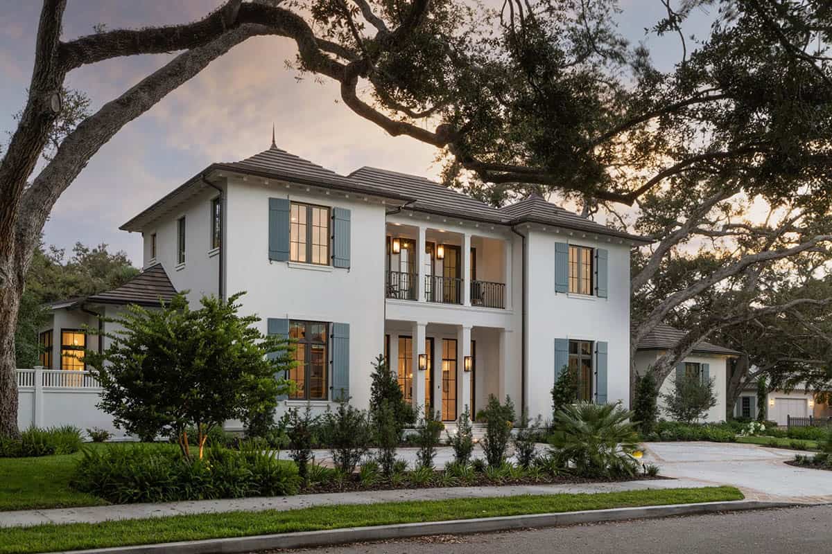 coastal style home exterior with live oak trees
