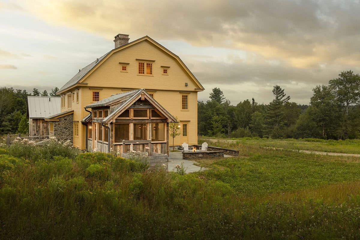 rustic colonial home exterior backyard view