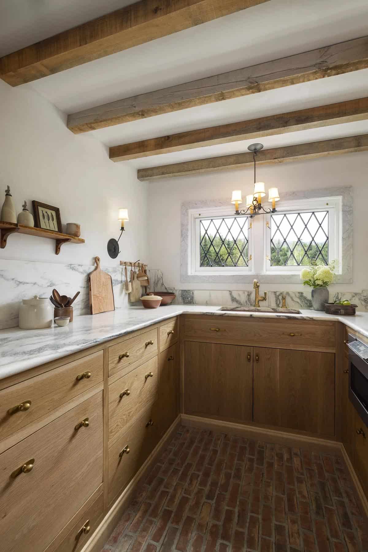 rustic kitchen with marble countertops and window