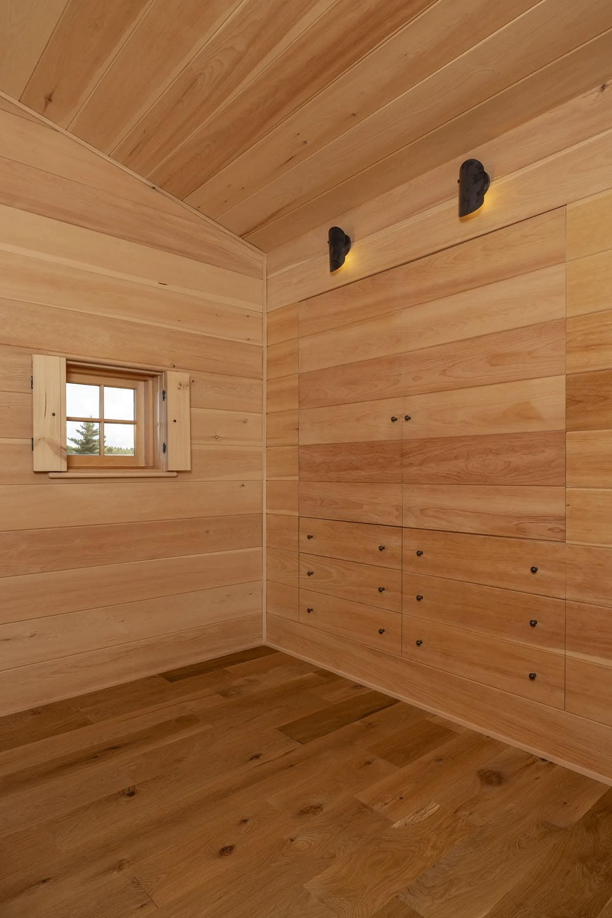 rustic walk-in closet with built-in storage