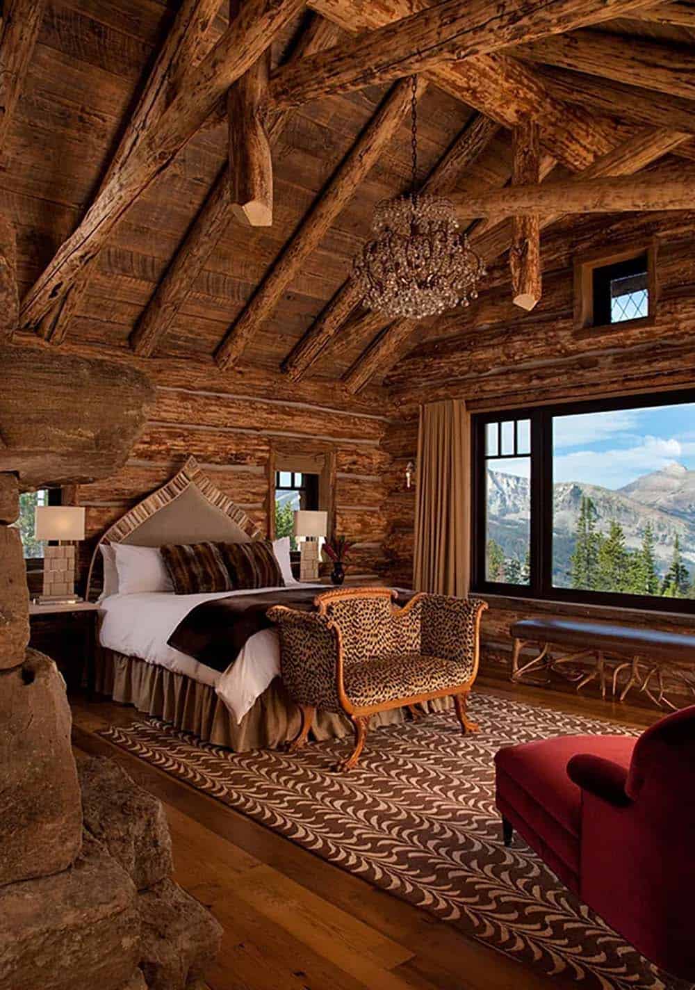 rustic bdroom with a vaulted ceiling and large window