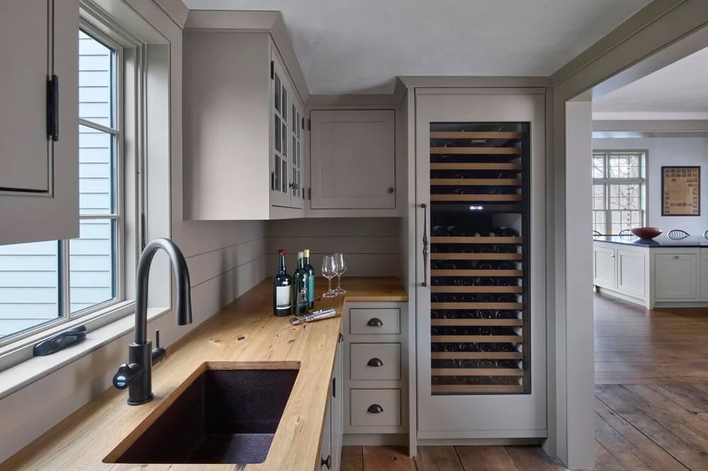 Saltbox Farm house butler's pantry with a sink and wine chiller