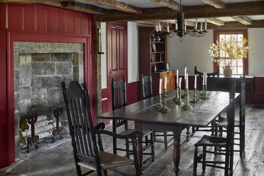 Saltbox Farm house dining room with a fireplace