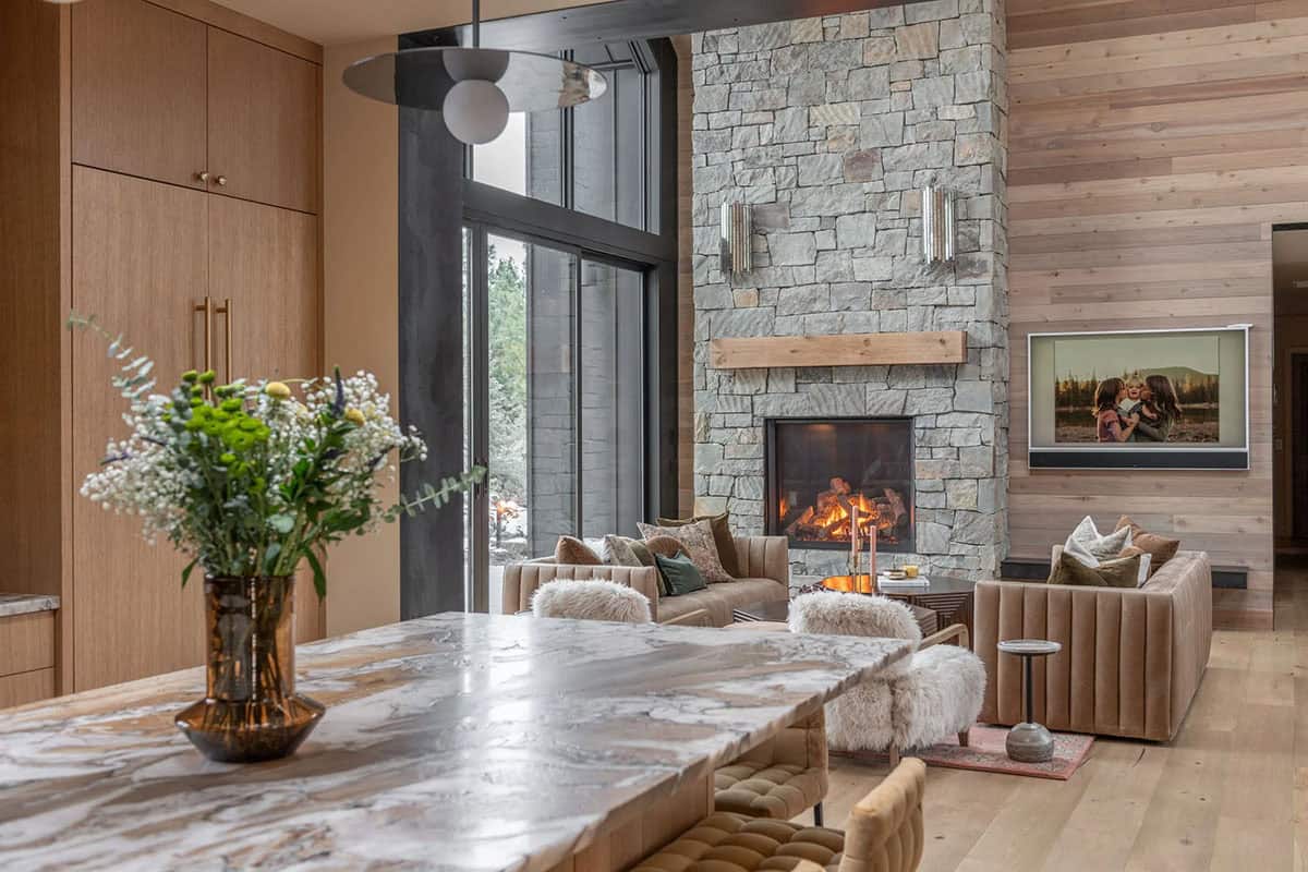 modern scandinavian style kitchen with a view of the living room