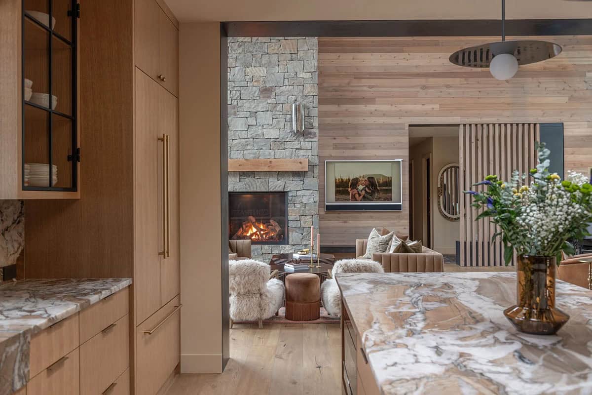 modern scandinavian style kitchen with a view of the living room