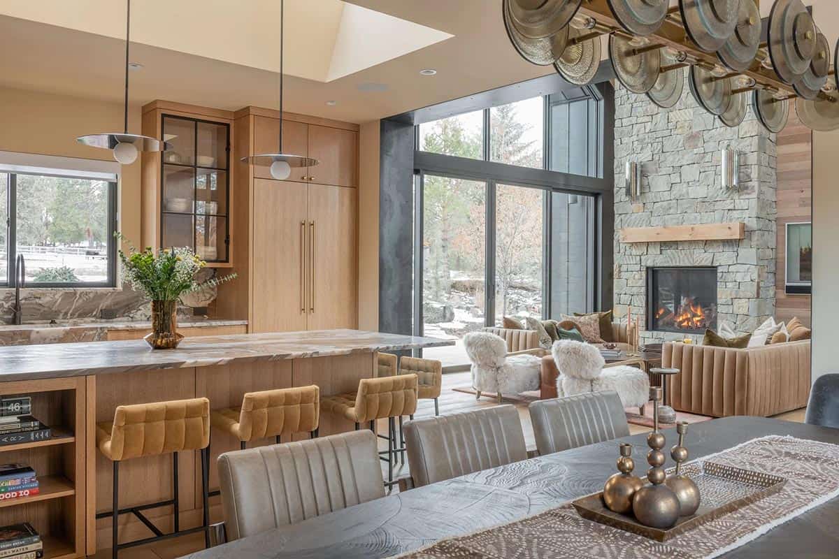 modern scandinavian style dining room with a view of the kitchen