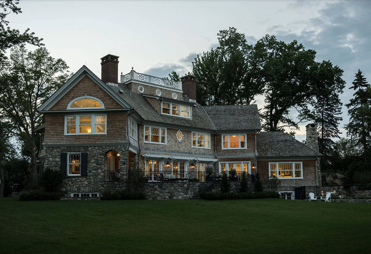 Beach Style Home Exterior at dusk