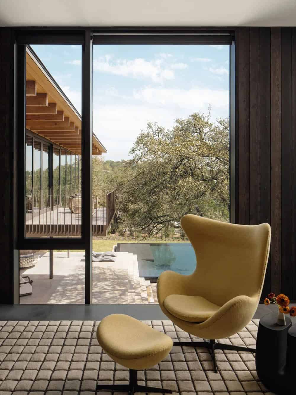 modern bedroom with a lounge chair