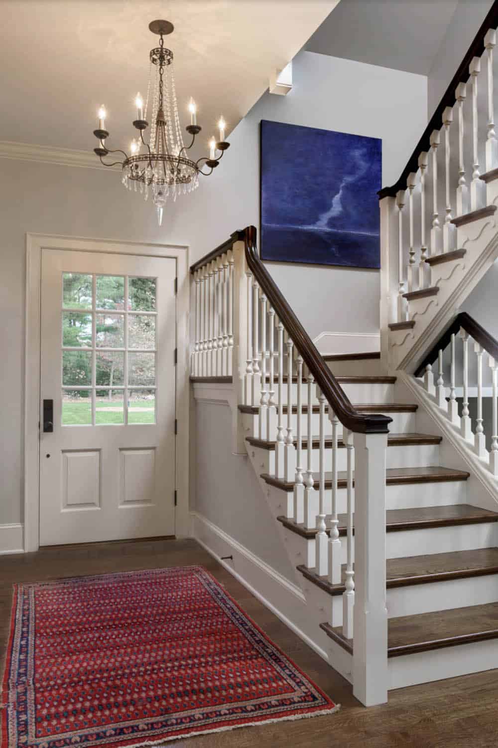 Traditional Home Entry with a Staircase