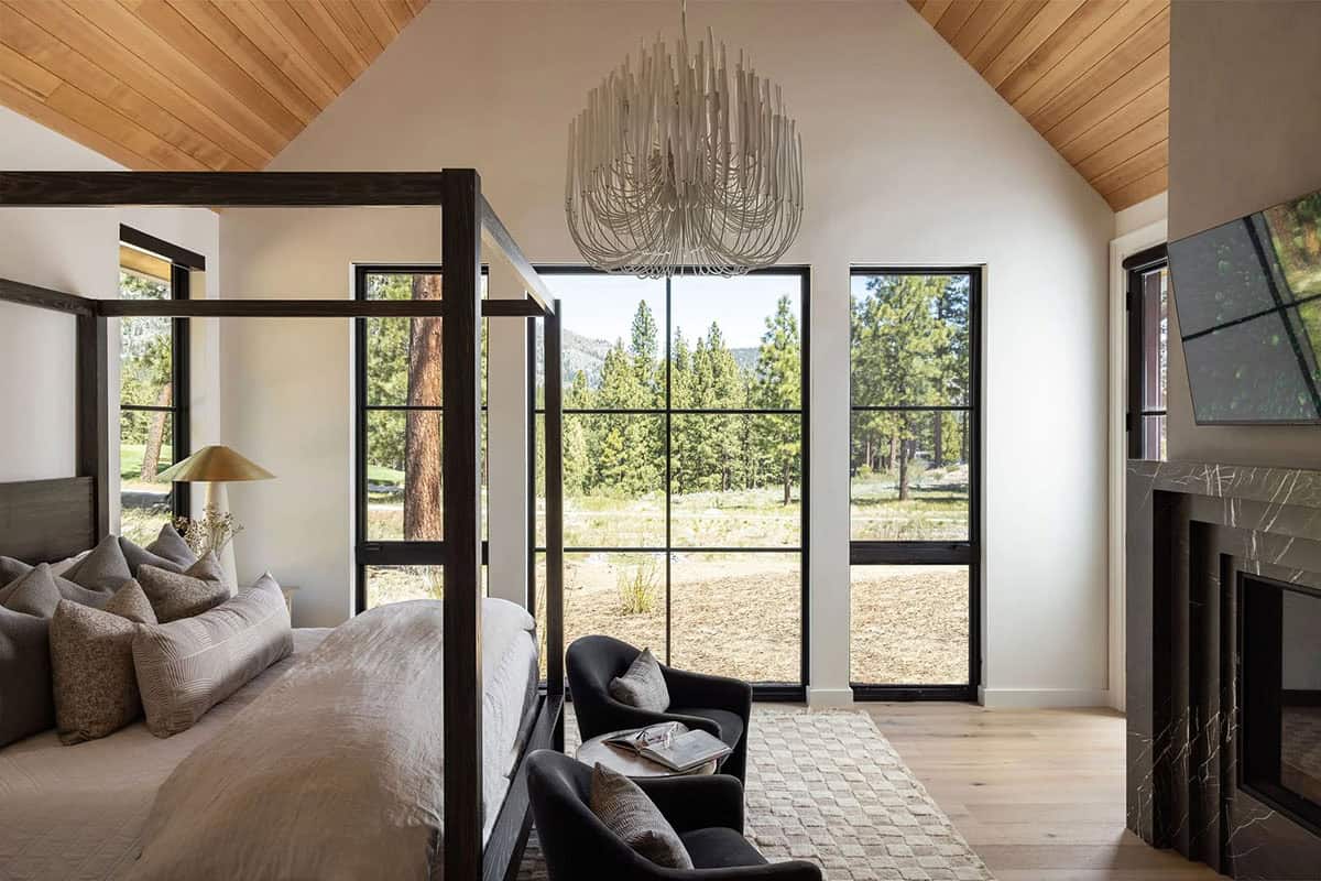 transitional bedroom with large windows