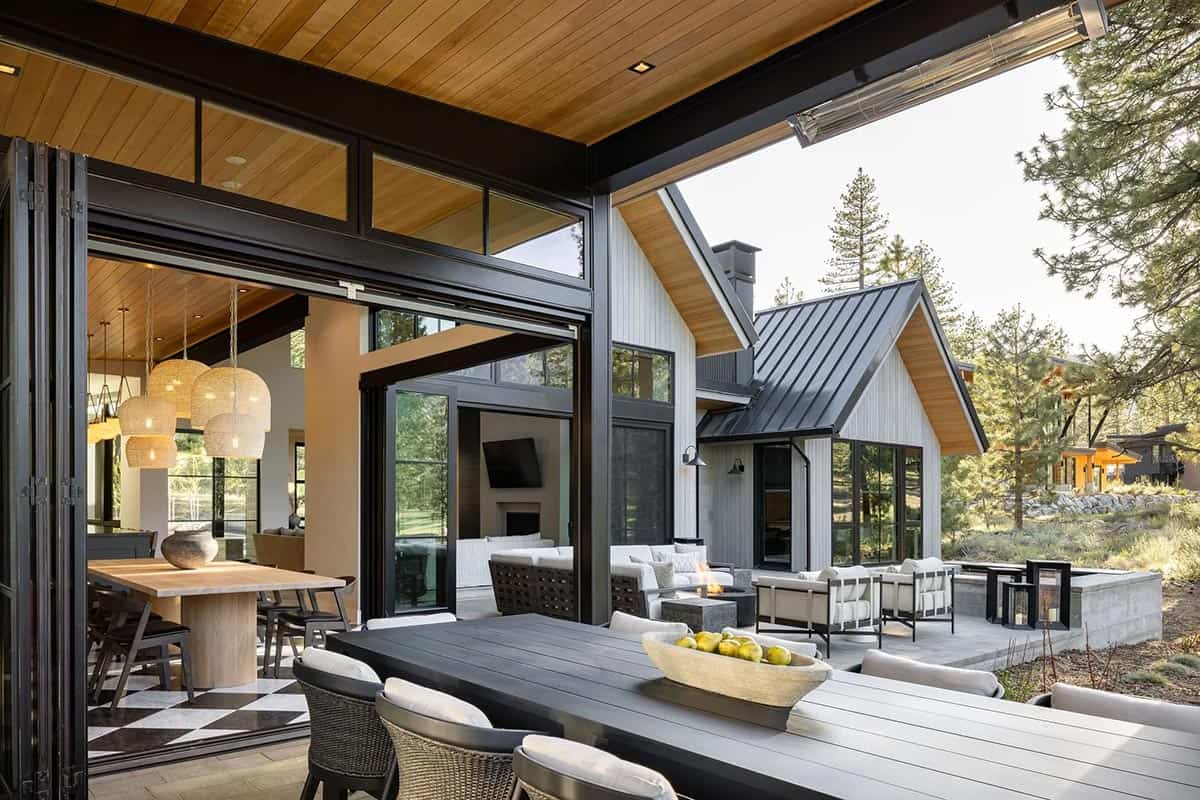 transitional mountain home exterior deck with alfresco dining