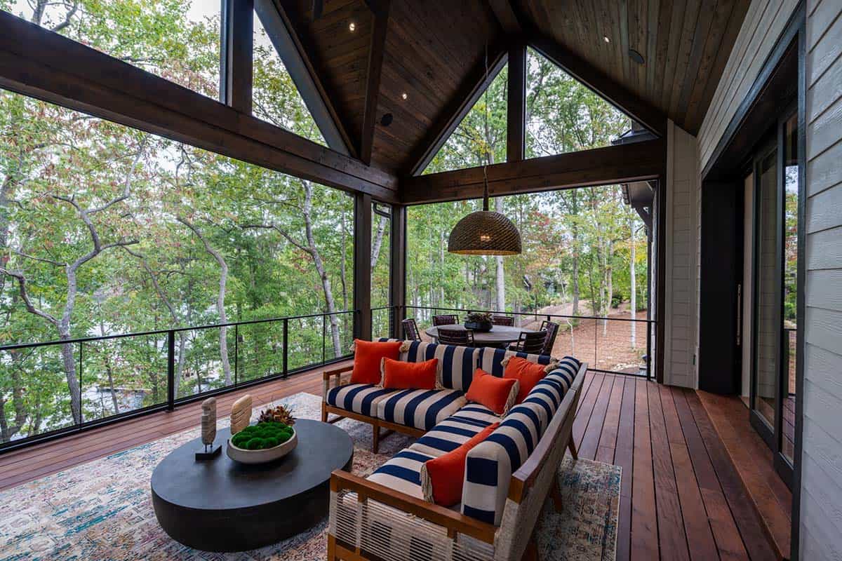 transitional style covered porch with outdoor furniture 