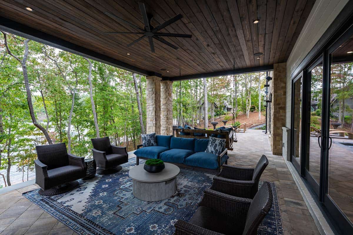 transitional style covered porch with outdoor furniture 