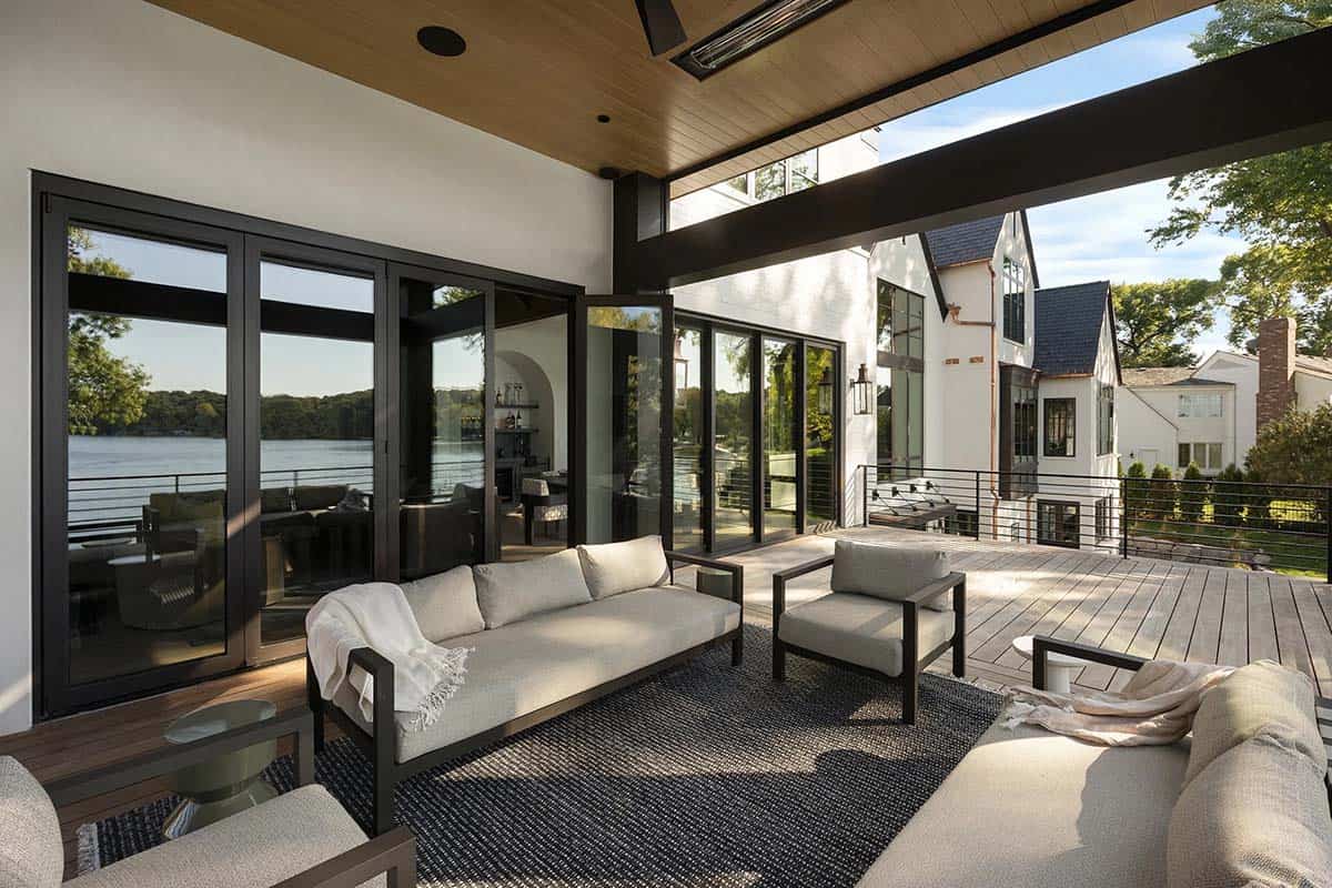 transitional style covered patio with outdoor furniture